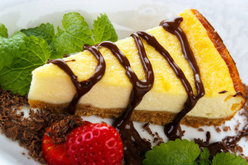 Cheesecake with chocolate and strawberry