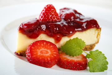 Cheesecake with strawberry jam and strawberries