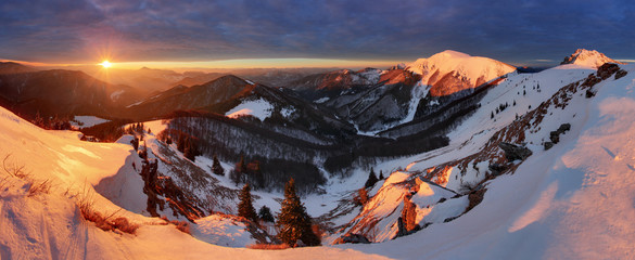 Fototapeta premium Winter mountains landscape at sunrise, panorama