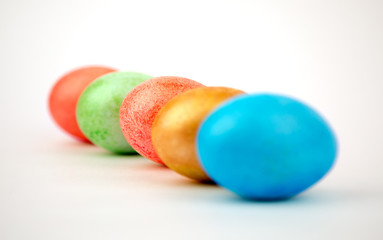 multicolored Easter eggs on white background