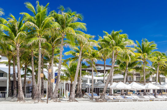 Tropical resort view at exotic white sandy beach on Boracay
