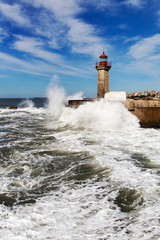 Obraz premium Waves on brekwater in Porto, Portugal.