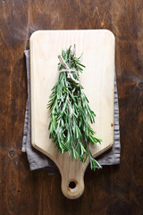 Bunch of rosemary on a cutting board