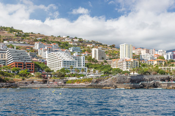 Fototapeta na wymiar Seascape coastline Madeira Island with modern Hotels of Funchal