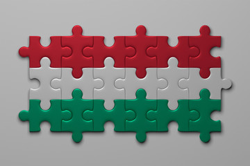 Obraz premium Hungarian flag of puzzle pieces