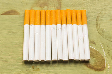 Cigarettes on Grunge Wood
