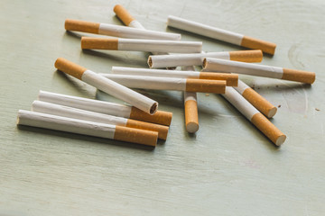 Cigarettes on Grunge Wood