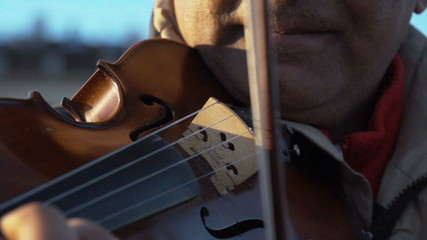 Violin in the city. Find similar clips in our portfolio.