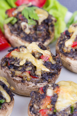 Stuffed champignons with eggs, cheese and paprika.