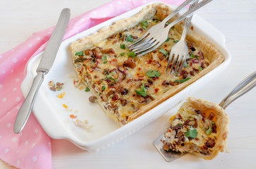 Homemade mushroom pie in white baking dish