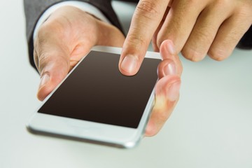 Businessman using his smart phone