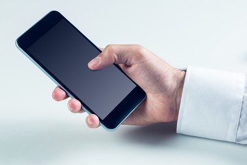 Businessman using his smart phone