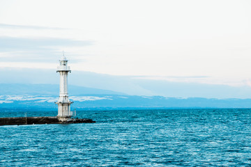 Fototapeta na wymiar Pâquis Lighthouse / Phare des Pâquis - Geneva
