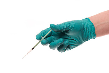 Hand with glove hold a syringe
