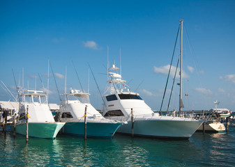Fototapeta na wymiar Luxury yachts moored in the marina of the Caribbean sea