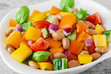 salad with beans bell pepper and tomato cucumber