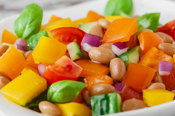 salad with beans bell pepper and tomato cucumber