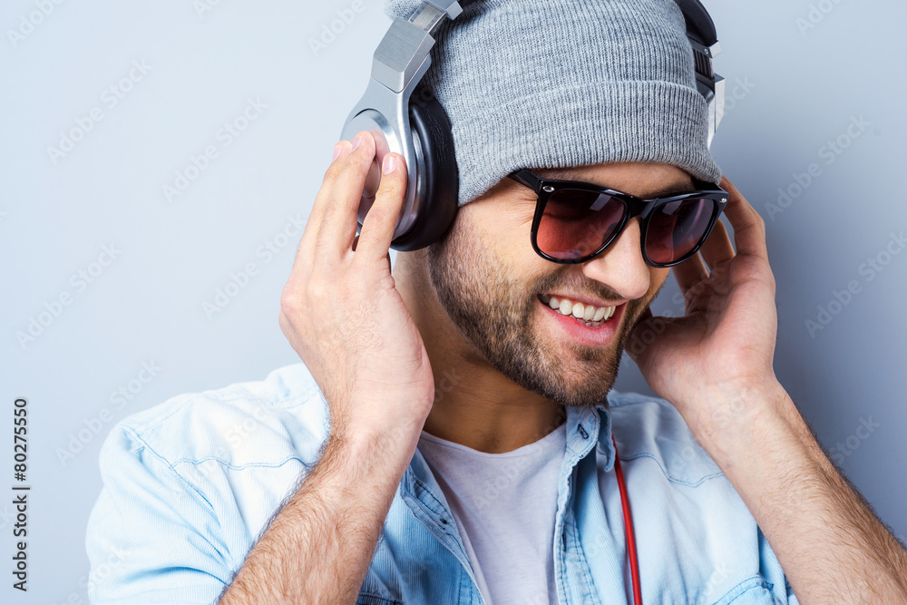 Poster enjoying his favorite music.