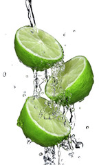 Three slices of lime poured with water