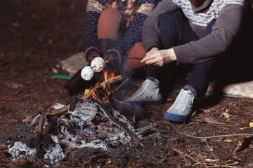 Couple tent camping in the wilderness