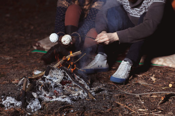 Couple tent camping in the wilderness
