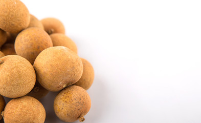 Longan fruit over white background