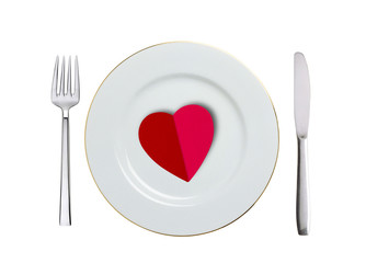 Fototapeta na wymiar red heart on white plate, spoon and fork isolated on white