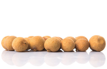 Longan fruit over white background