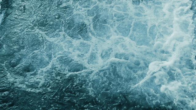 Water foam flowing. Abstract deep blue background. Seamless