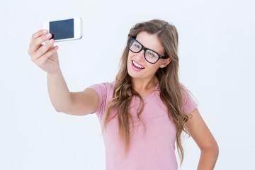 Pretty blonde taking a selfie of herself