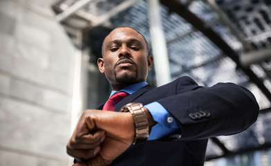 Businessman looking at his watch