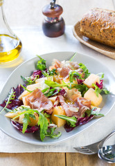 Prosciutto with rocket and cantaloupe salad