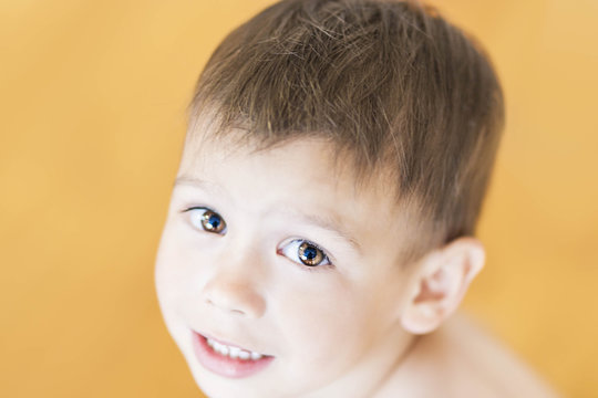 Portrait of Happy Smiling Caucasian Boy. Shallow Depth of Field