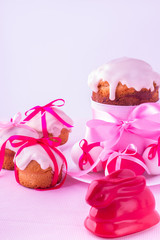 Decorated easter cakes and eggs  in pink pastel colours. Selecti