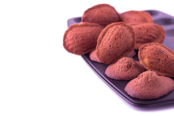 Traditional french pastry (cookie) Madeleine isolated on white b