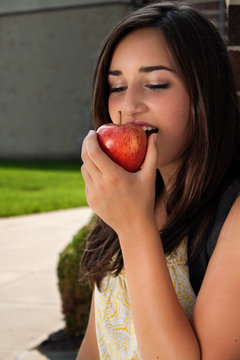 Healthy Student Girl Eating Apple