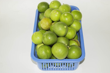 Lime in plastic baskets.