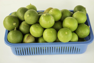 Lime in plastic baskets.