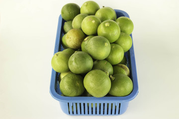 Lime in plastic baskets.