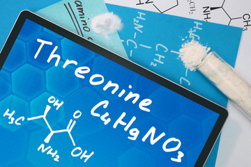Tablet with the chemical formula of threonine . Amino acids.