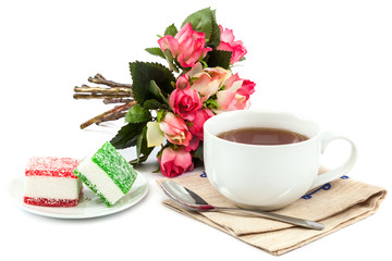 Obraz na płótnie Canvas Flowers roses, tea and sweet candy.