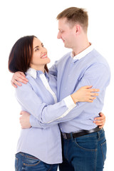 happy young man and woman hugging isolated on white