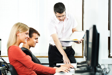 Students learning in computer lab