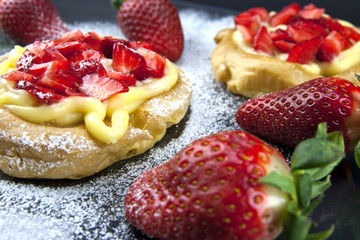 Zeppole with strawberry- tipical italian pastry