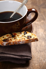 Sweet coffee with biscotti on the boards