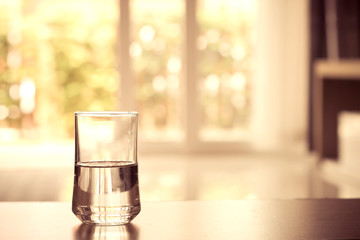 closeup Glass of water on table in the living room