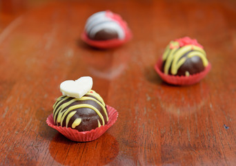 Chocolate on wood background