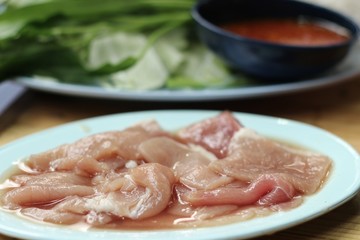 Raw pork in the dish for sukiyaki.