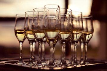 glasses with champagne on a try