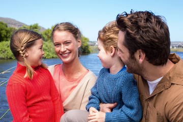 Happy family at a lake